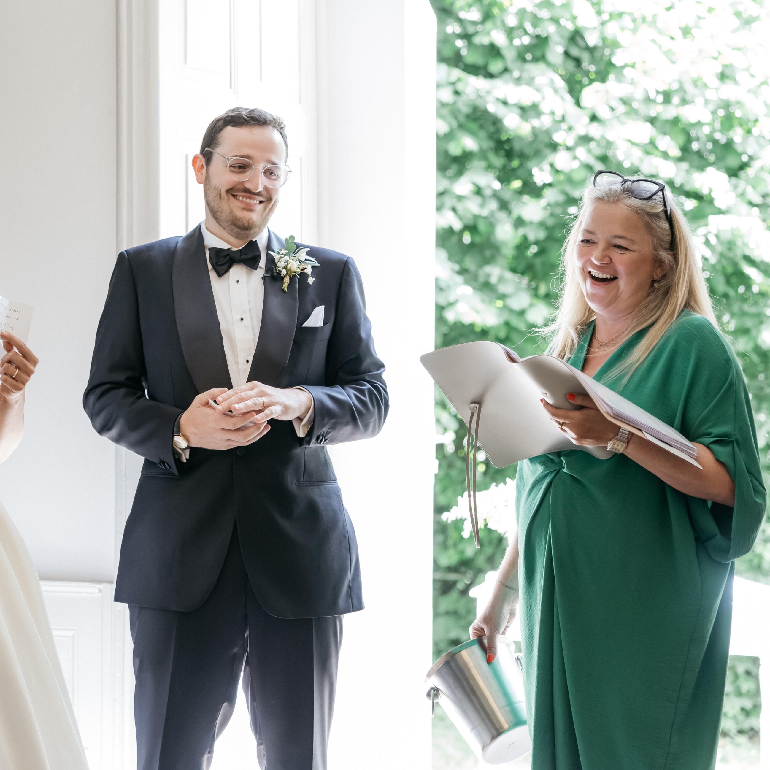 Celebrant and Groom Laugh